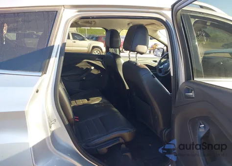 2014 Ford Escape Titanium z USA, uszkodzony, nr VIN 1FMCU9J92EUC05477